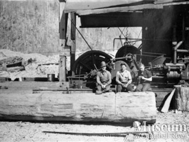 Loggers with a steam donkey in Phillips Arm