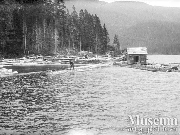 Log boom and the shack at Nimpkish Lake